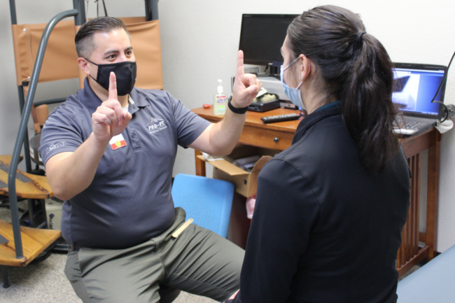 PRO~PT physical therapist gives a concussion test