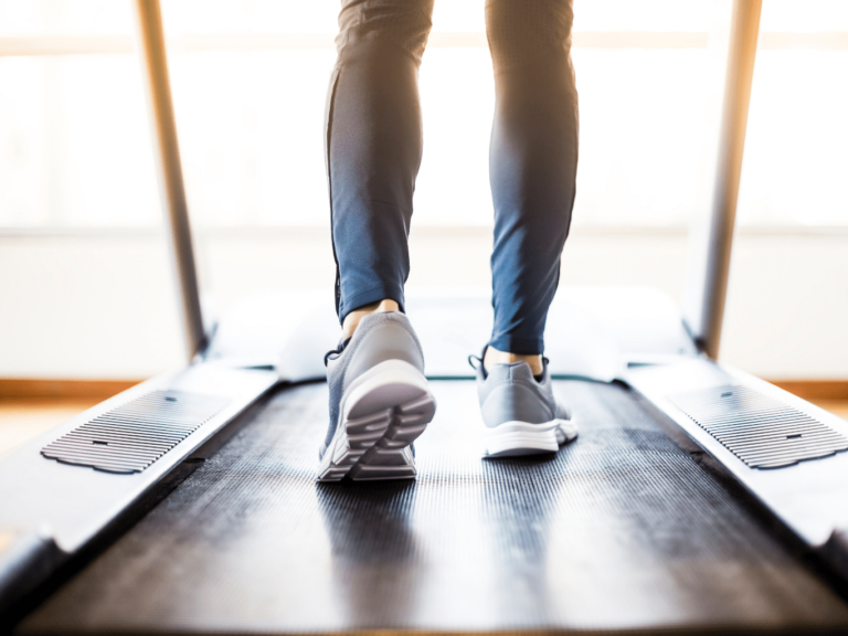 Person using a treadmill while experiencing pain