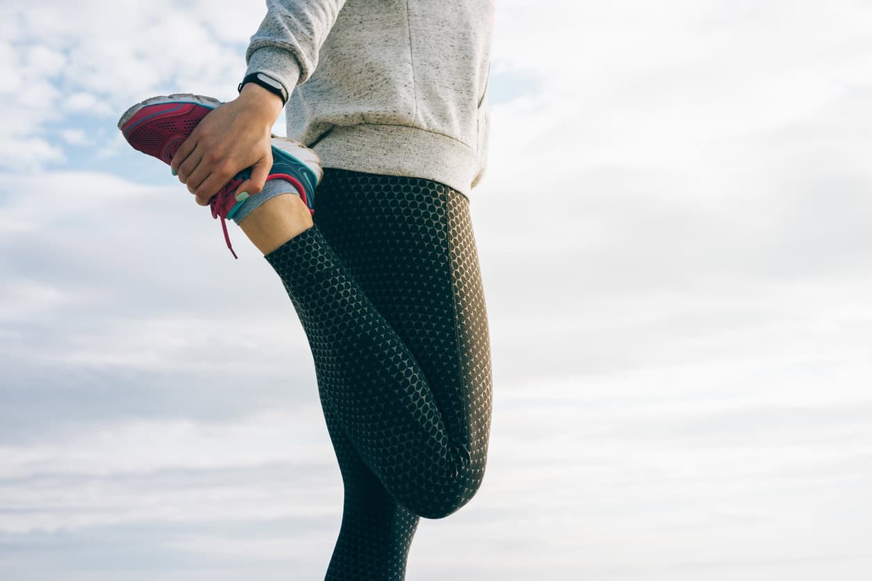 Stretching exercise outdoors for flexibility and fitness.