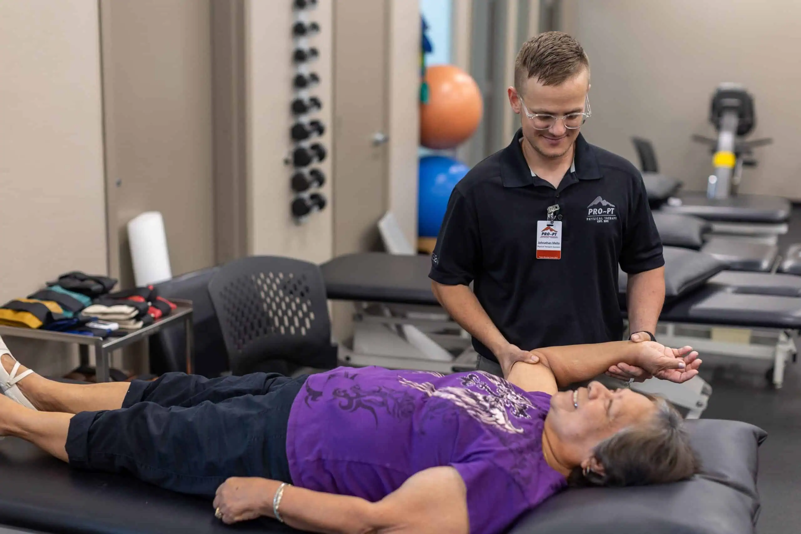 PRO~PT therapist with a patient